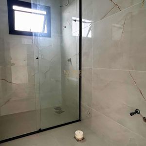 Casa com 140m², 3 dormitórios, 1 suíte, 2 vagas no bairro Morada das Palmeiras em Torres para Comprar