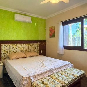 Casa com 156m², 3 dormitórios, 1 suíte, 4 vagas no bairro Praia Itapeva em Torres para Comprar