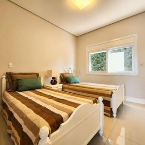 Casa de Condomínio com 440m², 5 dormitórios, 5 suítes, 2 vagas no Ocean Side em Torres para Comprar