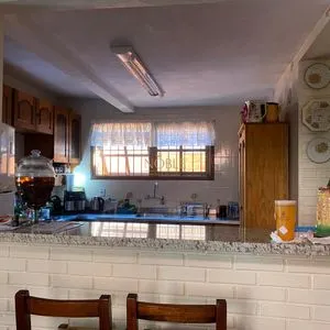 Casa com 247m², 5 dormitórios, 3 suítes, 3 vagas no bairro Praia Grande em Torres para Comprar