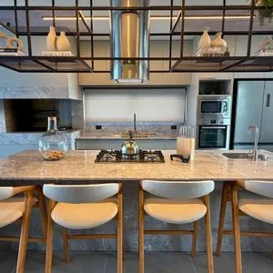 Casa de Condomínio com 277m², 3 dormitórios, 3 suítes, 2 vagas no Reserva das Águas em Torres para Comprar