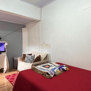 Casa com 300m², 4 dormitórios, 1 suíte no bairro Getúlio Vargas em Torres para Comprar