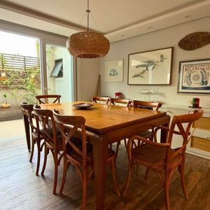 Casa com 200m², 3 dormitórios, 1 suíte, 2 vagas no bairro Praia Grande em Torres para Comprar