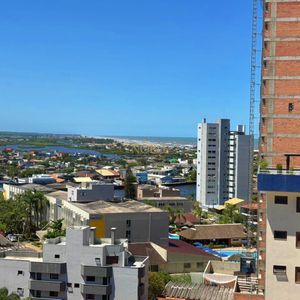 Apartamento com 91m², 2 dormitórios, 2 suítes, 2 vagas no Toronto em Torres para Comprar