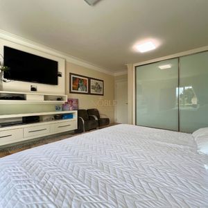 Casa com 600m², 4 dormitórios, 1 suíte, 4 vagas no bairro Igra Norte em Torres para Comprar