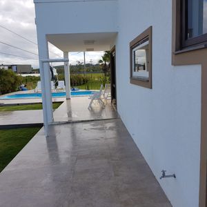 Casa de Condomínio com 416m², 3 dormitórios, 1 suíte, 2 vagas no Reserva das Águas em Torres para Comprar