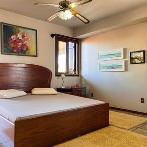 Casa com 338m², 4 dormitórios, 2 suítes, 3 vagas no bairro Centro em Passo de Torres para Comprar