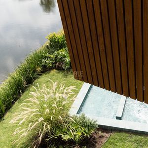 Casa de Condomínio com 244m², 4 dormitórios, 4 suítes, 2 vagas no Condomínio Ilhas Park em Torres para Comprar