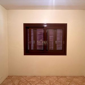 Casa com 420m², 5 dormitórios, 3 suítes, 1 vaga no bairro Centro em Torres para Comprar