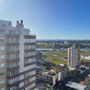 Apartamento com 120m², 3 dormitórios, 1 suíte, 2 vagas no Véritas em Torres para Comprar