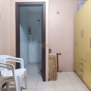 Casa, 6 dormitórios, 2 suítes, 3 vagas no bairro Getúlio Vargas em Torres para Comprar