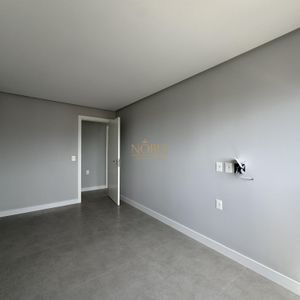 Apartamento com 108m², 3 dormitórios, 1 suíte, 2 vagas no Maui Residencial em Torres para Comprar