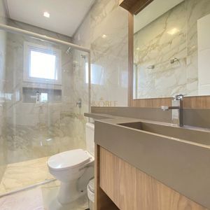 Casa de Condomínio com 151m², 3 dormitórios, 2 suítes, 2 vagas no Reserva das Águas em Torres para Comprar