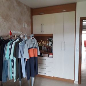 Apartamento com 124m², 3 dormitórios, 1 suíte, 2 vagas no Torre do Sol em Torres para Comprar