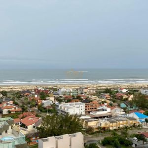 Duplex com 189m², 3 dormitórios, 1 suíte, 2 vagas no Torre de Athena em Torres para Comprar