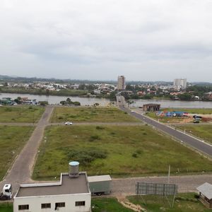 Apartamento com 124m², 3 dormitórios, 1 suíte, 2 vagas no Torre do Sol em Torres para Comprar