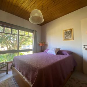 Casa com 135m², 3 dormitórios, 1 suíte, 1 vaga no bairro Bela Vista em Passo de Torres para Comprar