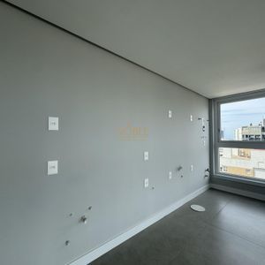 Apartamento com 102m², 3 dormitórios, 1 suíte, 2 vagas no Maui Residencial em Torres para Comprar