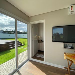 Casa de Condomínio com 151m², 3 dormitórios, 2 suítes, 2 vagas no Reserva das Águas em Torres para Comprar