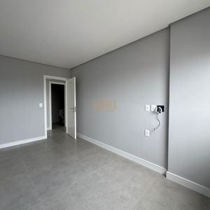 Apartamento com 102m², 3 dormitórios, 1 suíte, 2 vagas no Maui Residencial em Torres para Comprar