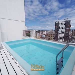 Apartamento com 135m², 3 dormitórios, 2 vagas no Plaza Mayor em Torres para Comprar