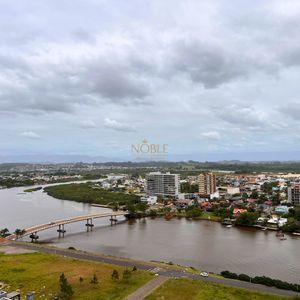 Apartamento com 91m², 2 dormitórios, 2 suítes, 2 vagas no Toronto em Torres para Comprar