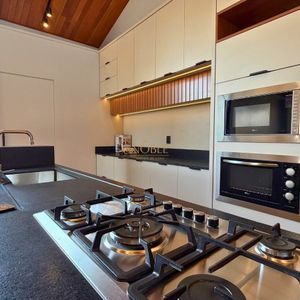 Casa com 180m², 3 dormitórios, 1 suíte, 2 vagas no bairro Praia da Cal em Torres para Comprar