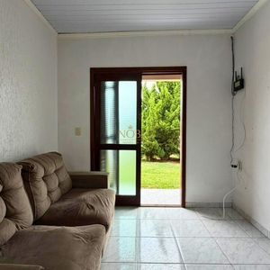 Casa com 74m², 2 dormitórios, 1 vaga no bairro Igra Sul em Torres para Comprar