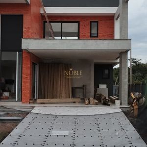 Casa de Condomínio com 204m², 3 dormitórios, 3 suítes, 2 vagas no Reserva das Águas em Torres para Comprar