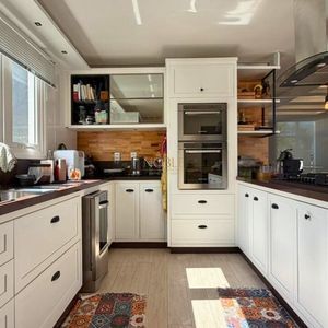 Casa com 210m², 3 dormitórios, 1 suíte, 2 vagas no bairro Novo Passo em Passo de Torres para Comprar