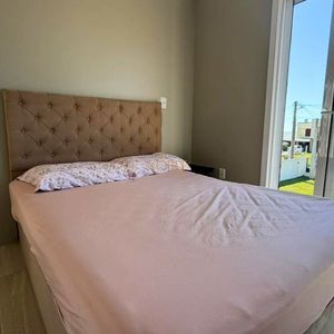 Casa com 120m², 3 dormitórios, 1 suíte, 2 vagas no bairro Loteamento Caravelle em Passo de Torres para Comprar