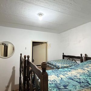 Casa com 88m², 6 dormitórios, 2 suítes, 3 vagas no bairro Praia Grande em Torres para Comprar