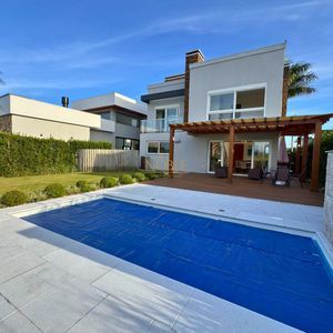 Casa de Condomínio com 187m², 3 dormitórios, 1 suíte, 4 vagas no Reserva das Águas em Torres para Comprar