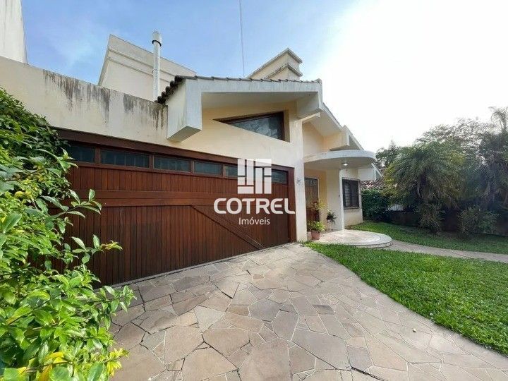 Casa à venda e locação,  4 dormitórios localizada no Bairro Nossa Sra de Lourdes