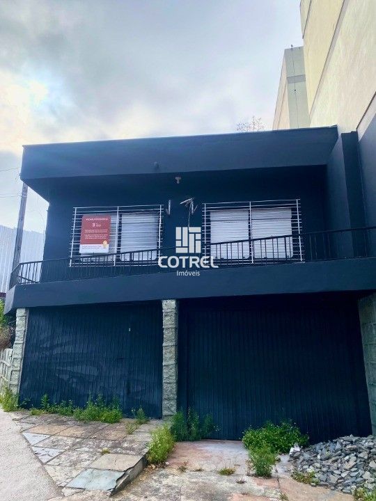 Casa Comercial para locação 5 salas, 2 vagas de garagem situada no Bairro Centro