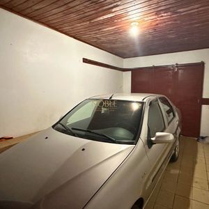 Casa, 3 dormitórios, 2 vagas no bairro Centro em Torres para Comprar