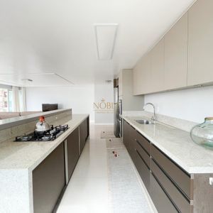 Apartamento com 124m², 3 dormitórios, 3 suítes, 2 vagas no Lê Classic em Torres para Comprar