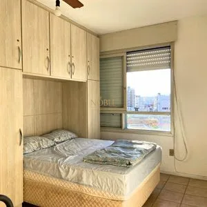 Apartamento com 60m², 2 dormitórios, 1 suíte, 1 vaga no Marina em Torres para Comprar