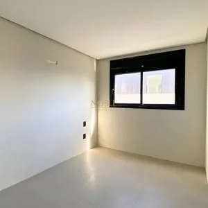 Apartamento com 72m², 2 dormitórios, 1 suíte, 1 vaga no Majestic Residencial em Torres para Comprar