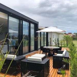 Casa de Condomínio com 275m², 3 dormitórios, 3 suítes, 2 vagas no Ocean Side em Torres para Comprar