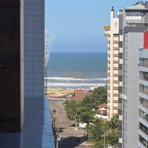 Apartamento com 98m², 2 dormitórios, 2 suítes, 2 vagas no Punta Del Sole em Torres para Comprar