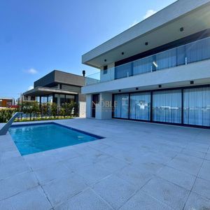 Casa de Condomínio com 311m², 3 dormitórios, 3 suítes, 2 vagas no Reserva das Águas em Torres para Comprar