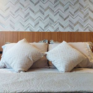 Apartamento com 102m², 3 dormitórios, 1 suíte, 2 vagas no Maui Residencial em Torres para Comprar