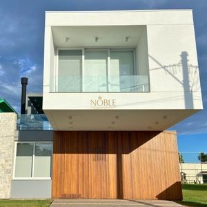 Casa de Condomínio, 4 dormitórios, 4 suítes, 2 vagas no Condomínio Ilhas Park em Torres para Comprar