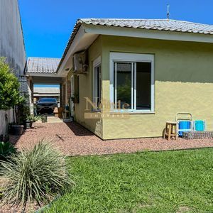 Casa, 2 dormitórios, 2 vagas no bairro Igra Norte em Torres para Comprar