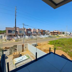 Geminado com 110m², 3 dormitórios, 1 suíte, 1 vaga no bairro Morada das Palmeiras em Torres para Comprar