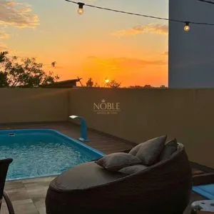 Casa com 108m², 2 dormitórios, 2 vagas no bairro Capão do Cravo em Passo de Torres para Comprar