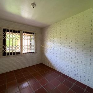 Casa com 100m², 2 dormitórios, 3 vagas no bairro Praia da Cal em Torres para Comprar