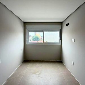 Apartamento com 70m², 2 dormitórios, 1 suíte, 1 vaga no Topazio em Torres para Comprar