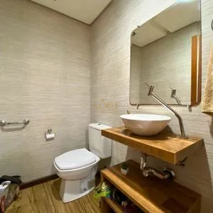Casa com 272m², 4 dormitórios, 1 suíte, 3 vagas no bairro Igra Norte em Torres para Comprar